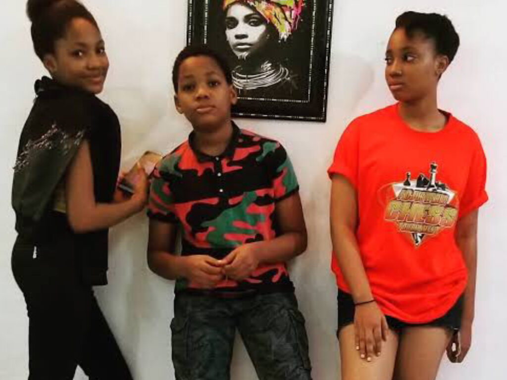 Angel Unigwe with her siblings Buchi Unigwe and Princess Chizzi Unigwe posing