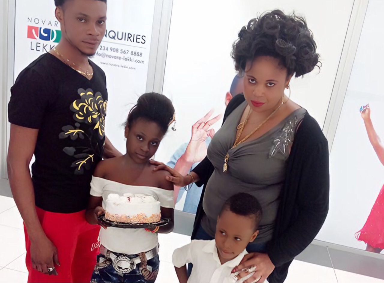 Isaac Fred with his mother and father, Mr and Mrs Ayor on his sister Emmanuella Ayor's birthday 