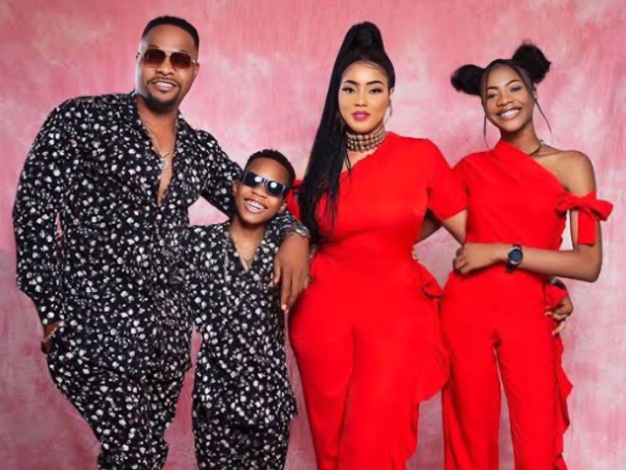 Bolanle Ninalowo in a family photo with his wife Bunmi Ninalowo, and two kids