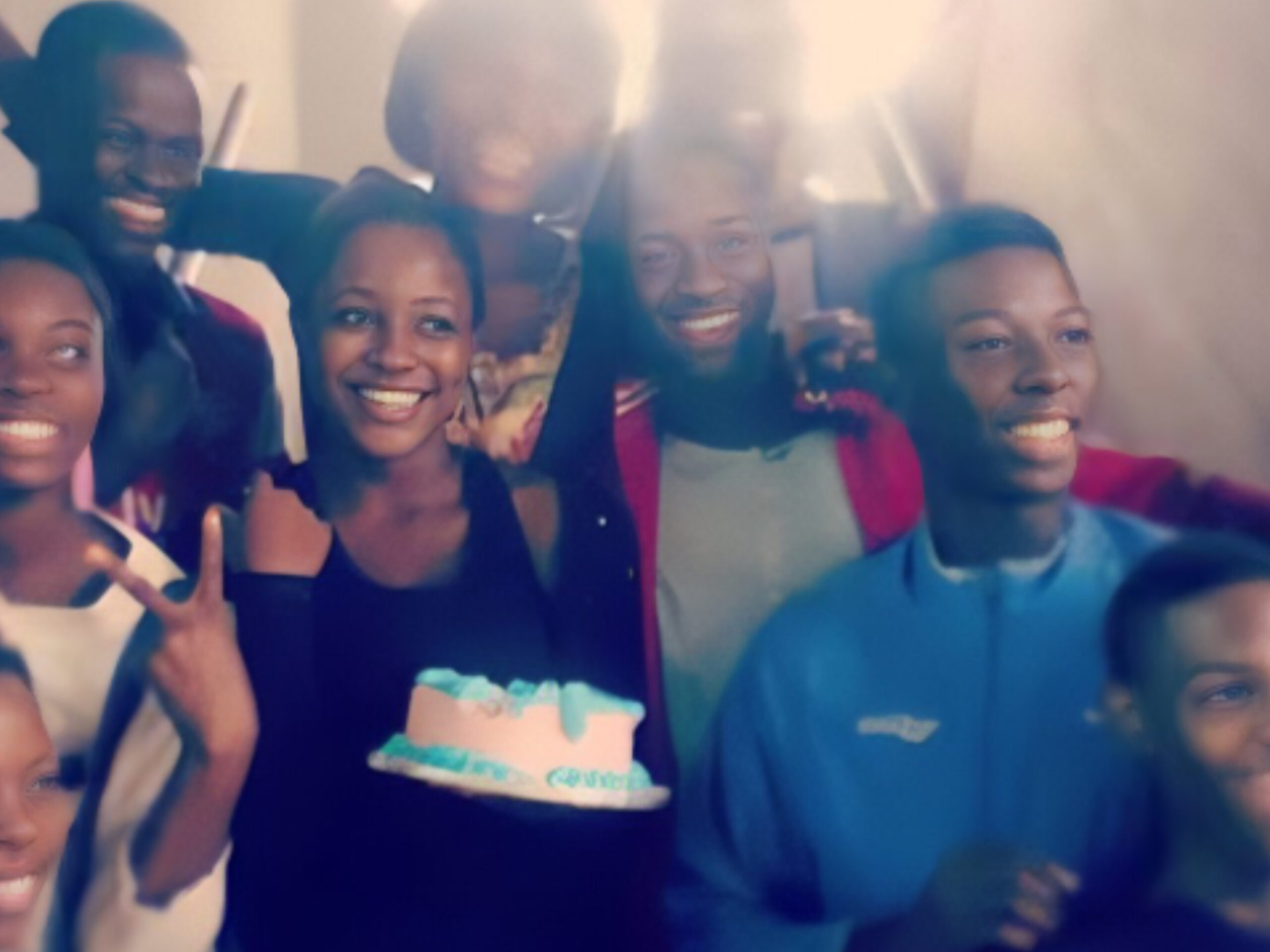 Martha Ehinome holding a cake on her 17th birthday surrounded by her friends and family (credit: Instagram/marthaehinome)