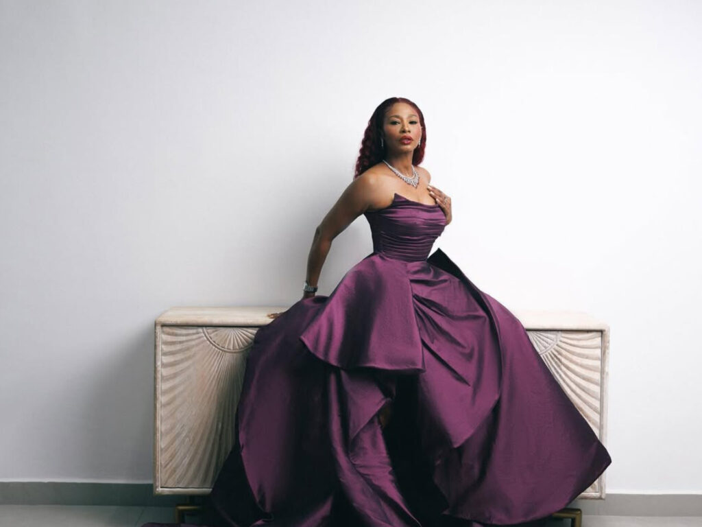 Nse Ikpe-Etim in purple dress