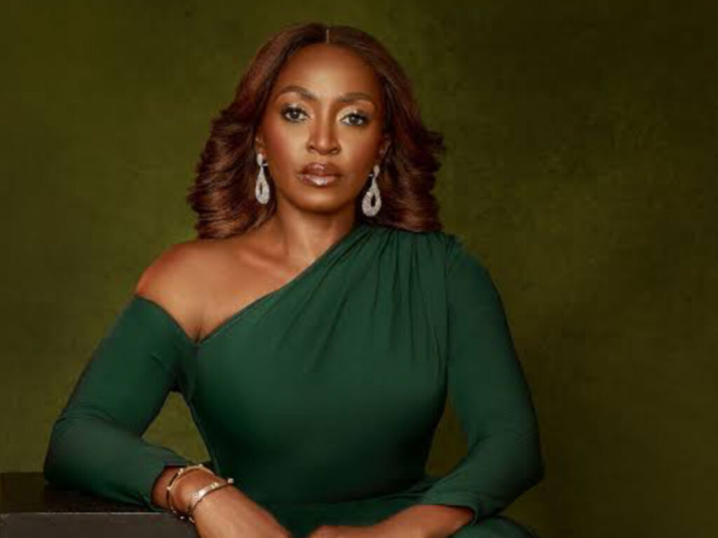 Kate Henshaw in green.